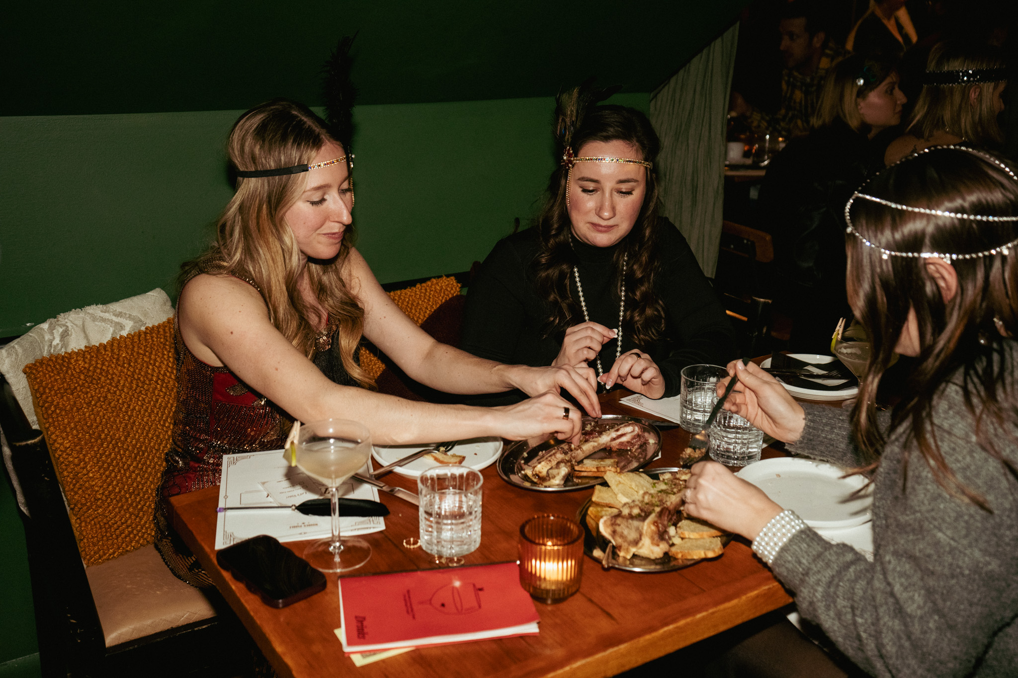 Friends sharing dishes at the communal table