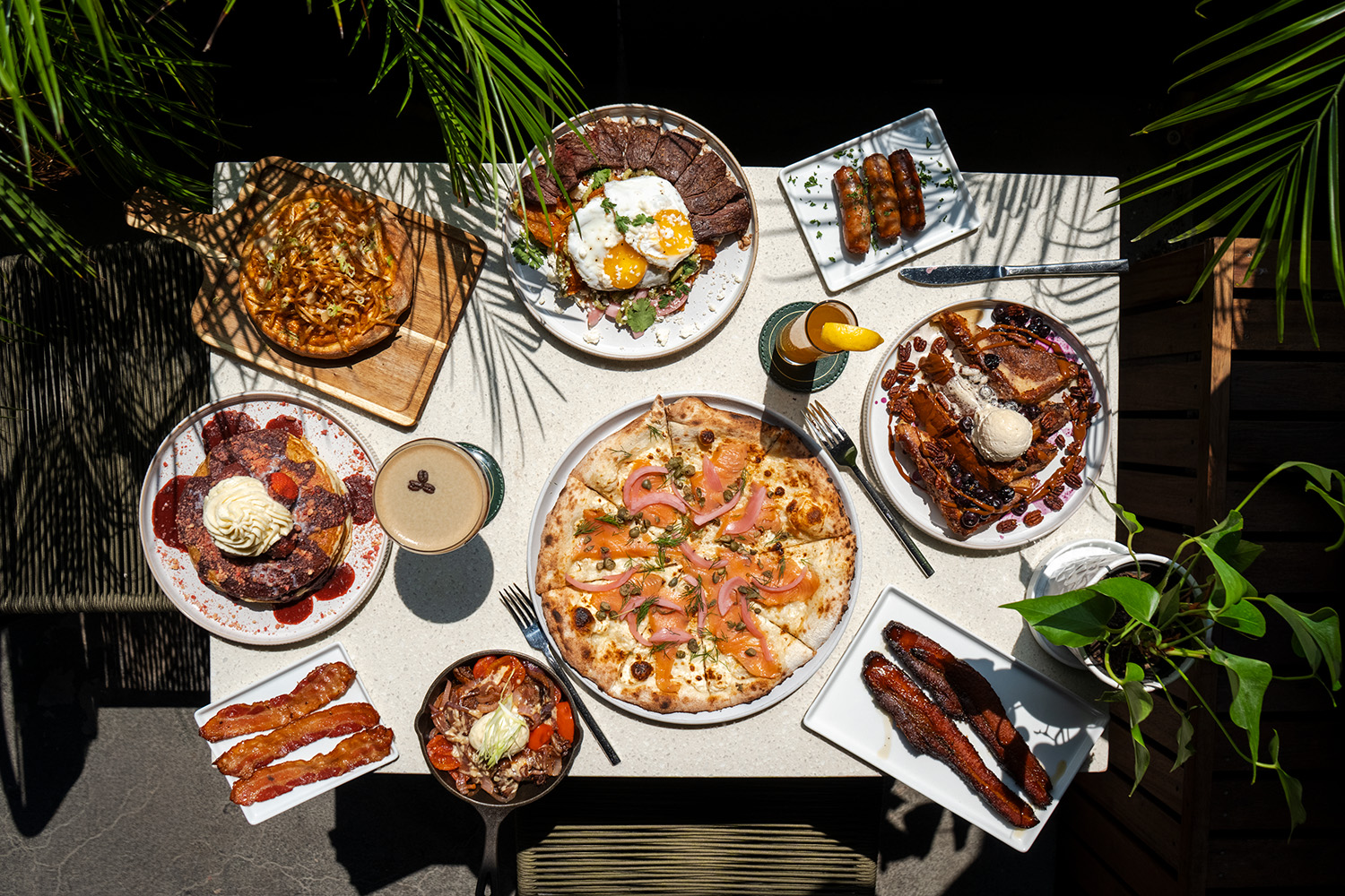 Overhead spread of the new Wooden Paddle brunch menu for No Labor, Day Brunch on Monday September 7